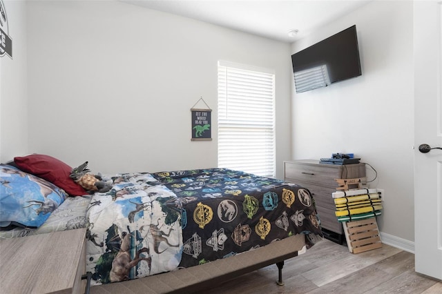 bedroom featuring light wood-type flooring