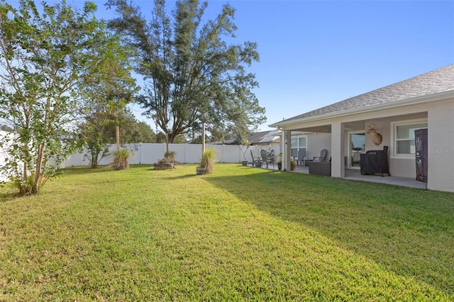 view of yard with a patio area