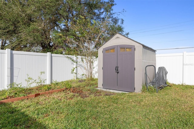 view of outdoor structure with a lawn