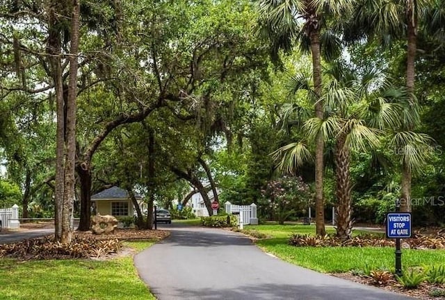 53 Sea Vista Dr, Palm Coast, FL 32137 - view of road featuring traffic signs