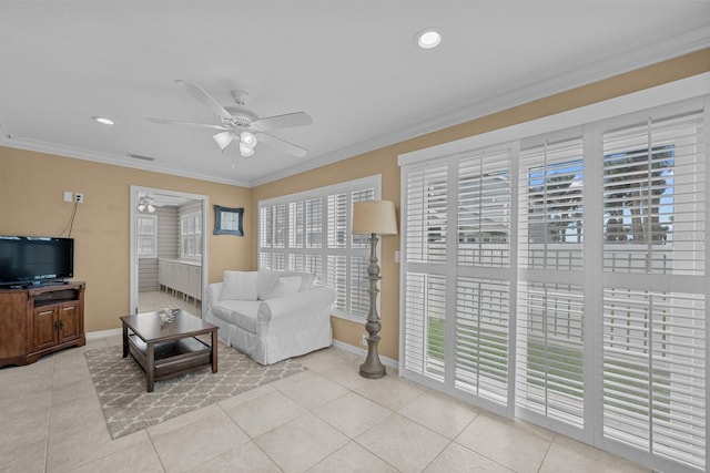 tiled living room with a wealth of natural light, crown molding, and ceiling fan