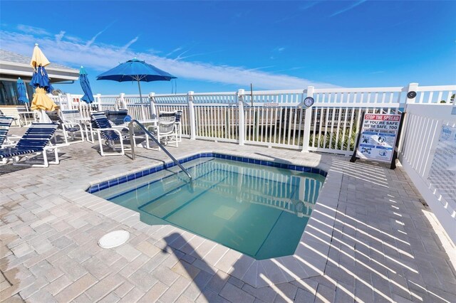 view of pool with a patio