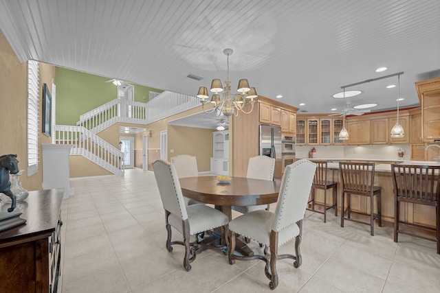 dining area featuring wood ceiling, a notable chandelier, and light tile patterned floors