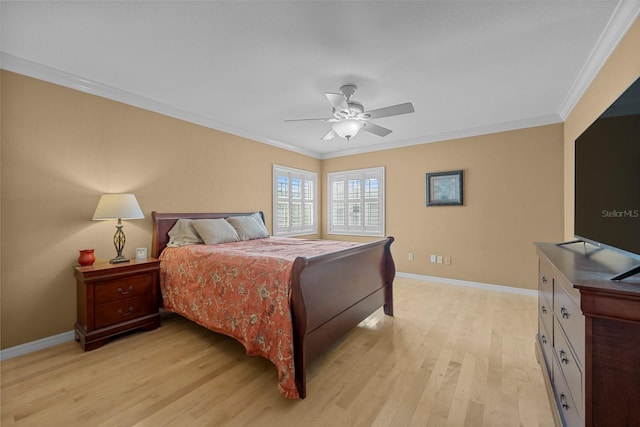 bedroom featuring crown molding, light hardwood / wood-style floors, and ceiling fan