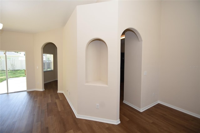 interior space with dark wood-type flooring