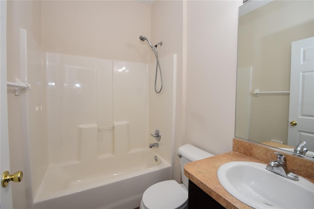 full bathroom featuring vanity, tub / shower combination, and toilet