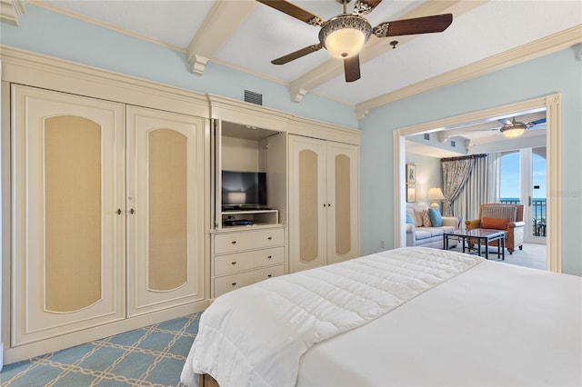 bedroom with a closet, ceiling fan, dark colored carpet, beam ceiling, and ornamental molding