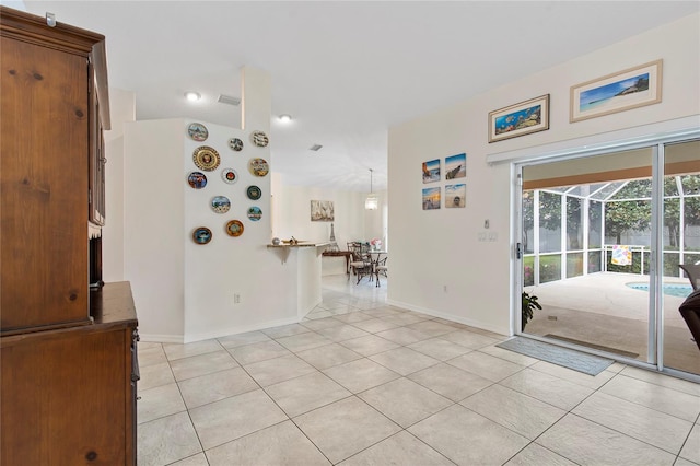 unfurnished room featuring light tile patterned flooring