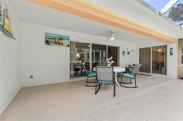 view of patio featuring ceiling fan