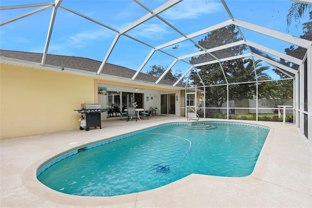 view of swimming pool featuring ceiling fan, a lanai, area for grilling, and a patio area