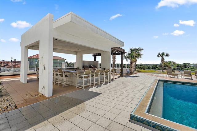 view of pool featuring a patio