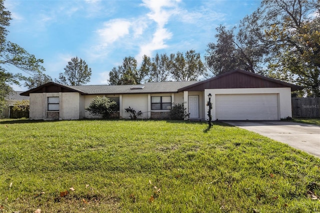 single story home with a front lawn and a garage