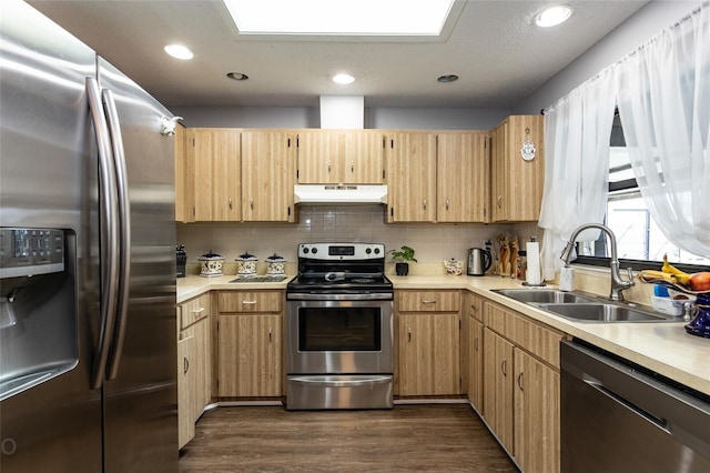 kitchen featuring dark hardwood / wood-style floors, stainless steel appliances, backsplash, sink, and light brown cabinetry