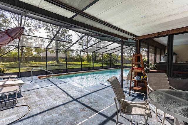 view of pool featuring a patio and a lanai