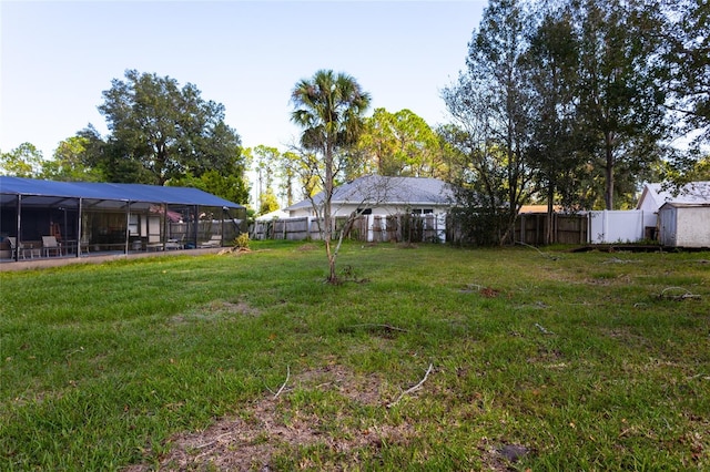 view of yard featuring a lanai