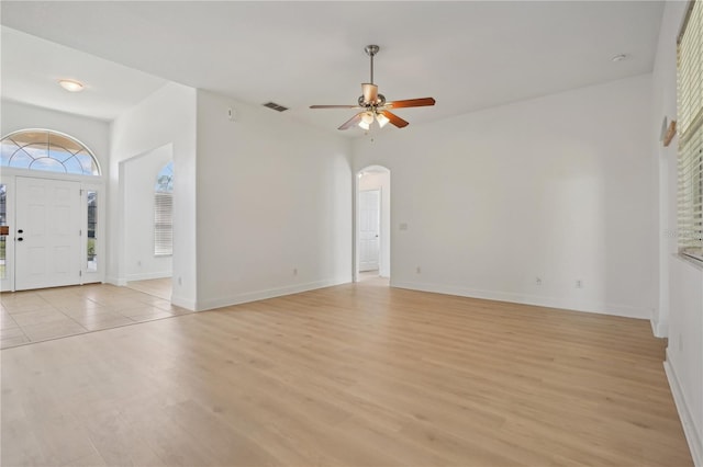 entrance foyer with light hardwood / wood-style flooring and ceiling fan