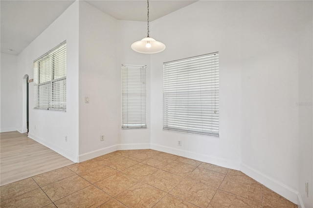 spare room with light wood-type flooring