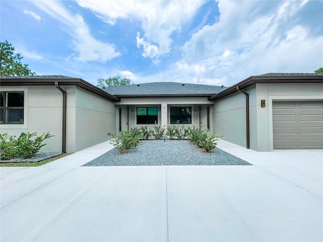 ranch-style home with a garage