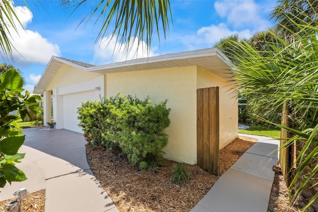 view of home's exterior featuring a garage