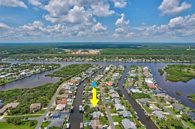 drone / aerial view with a water view