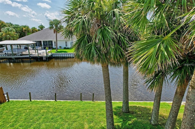 view of water feature with a dock