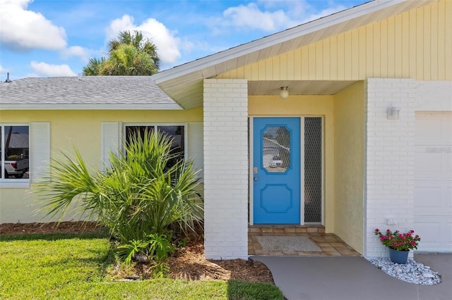 entrance to property featuring a garage