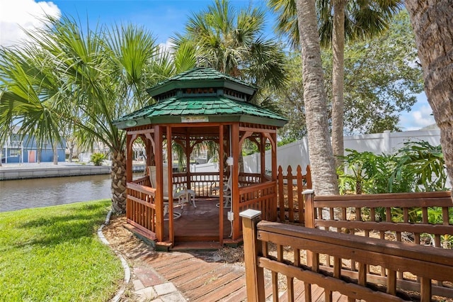 exterior space featuring a gazebo and a water view