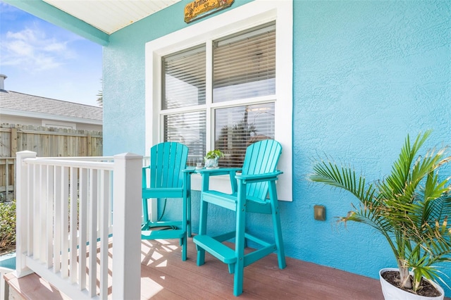 wooden balcony featuring a deck