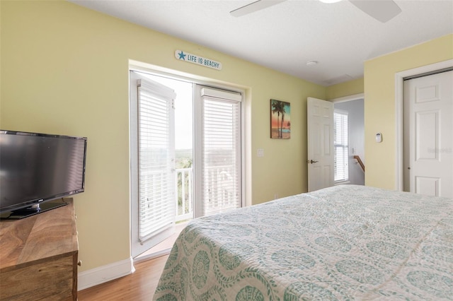 bedroom with ceiling fan and light hardwood / wood-style flooring