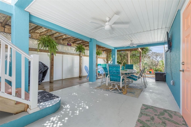 view of patio featuring ceiling fan