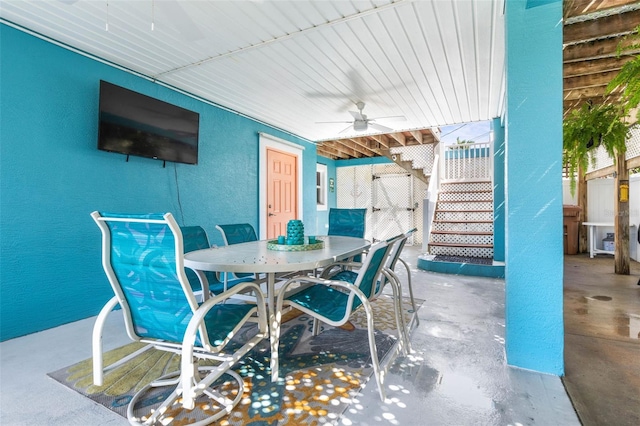 view of patio with ceiling fan