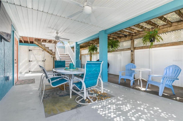 view of patio / terrace featuring ceiling fan