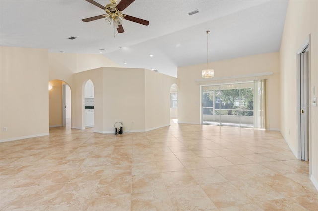 unfurnished room with ceiling fan, high vaulted ceiling, and a textured ceiling