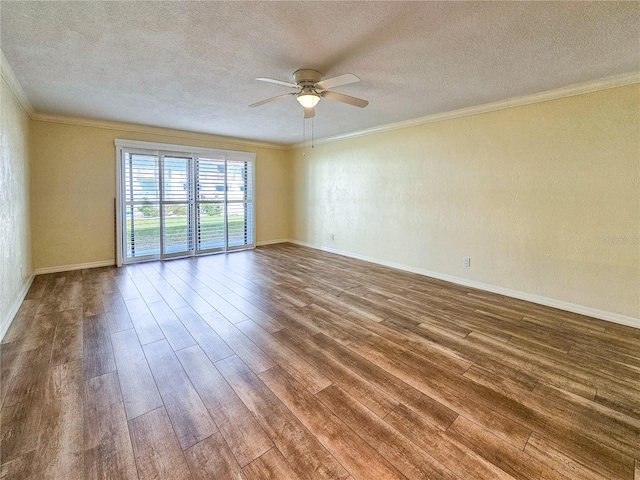 spare room featuring ornamental molding, a textured ceiling, wood-type flooring, and ceiling fan