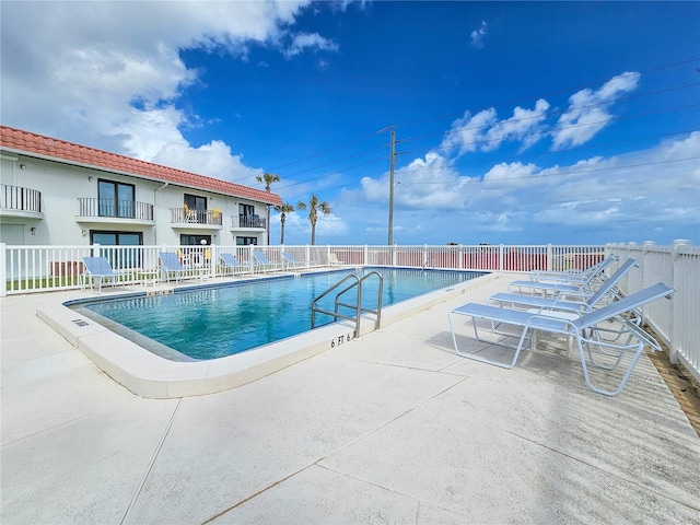 view of pool with a patio