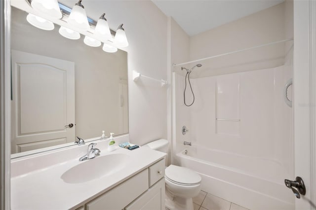 full bathroom featuring toilet, vanity,  shower combination, and tile patterned flooring