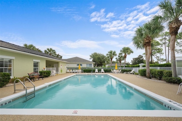 view of pool featuring a patio area