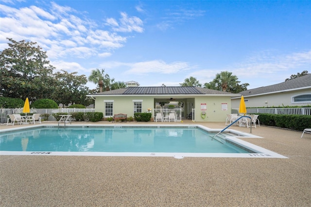 view of pool featuring a patio area