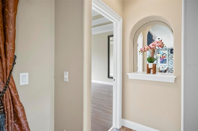 hall with hardwood / wood-style floors