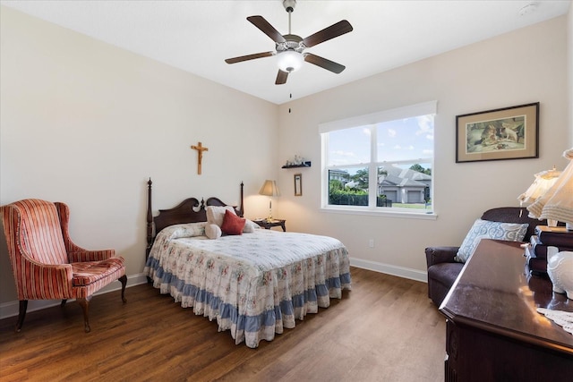 bedroom featuring ceiling fan and wood-type flooring