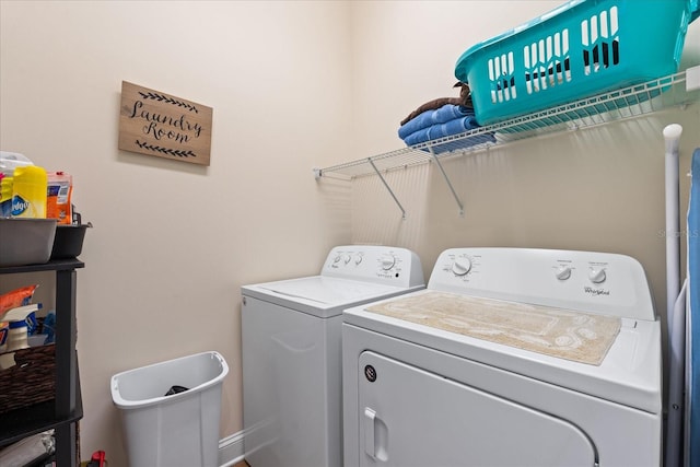 laundry room featuring washing machine and dryer