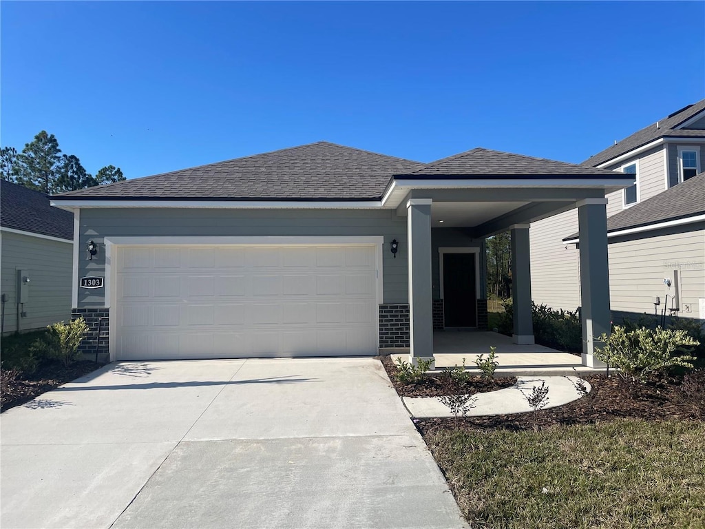 view of front of home with a garage