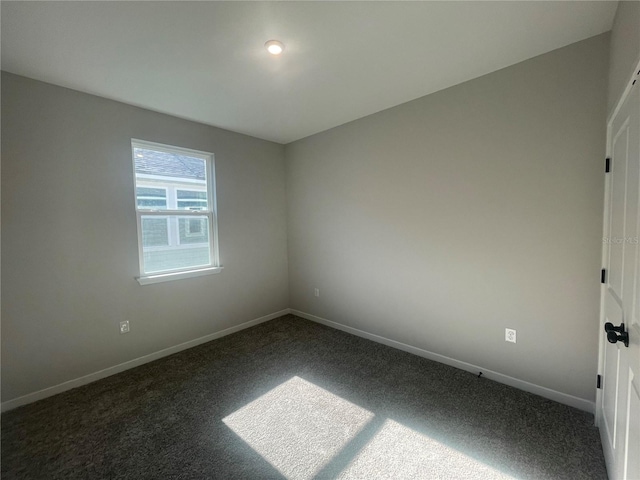 view of carpeted spare room