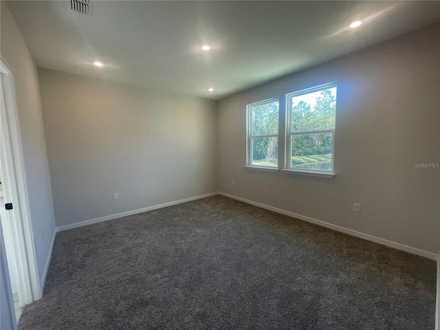 view of carpeted spare room