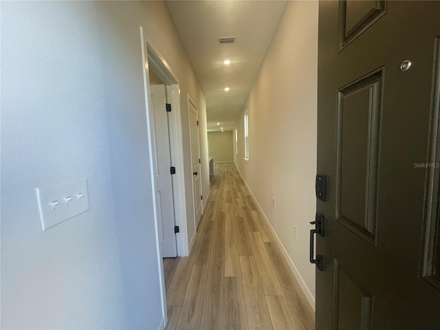 hallway featuring light hardwood / wood-style floors