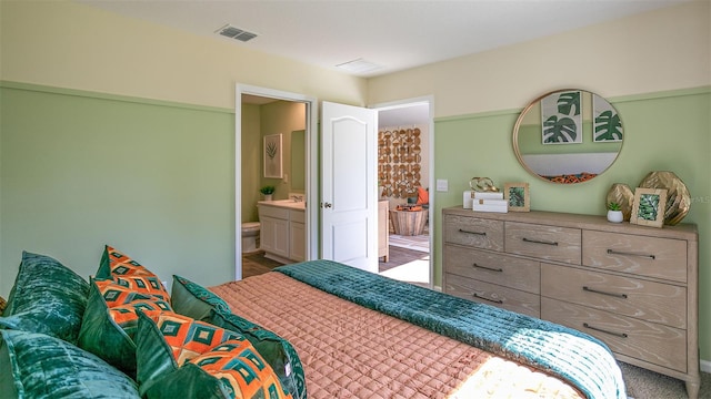 bedroom with connected bathroom