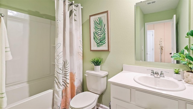 full bathroom with toilet, shower / bathtub combination with curtain, and vanity