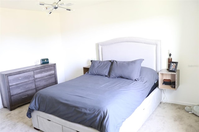 bedroom featuring light carpet