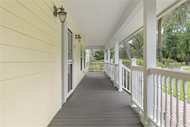 wooden deck featuring a porch