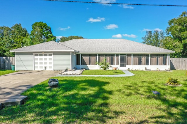 single story home featuring a front lawn and a sunroom